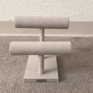 Beige linen jewelry stand